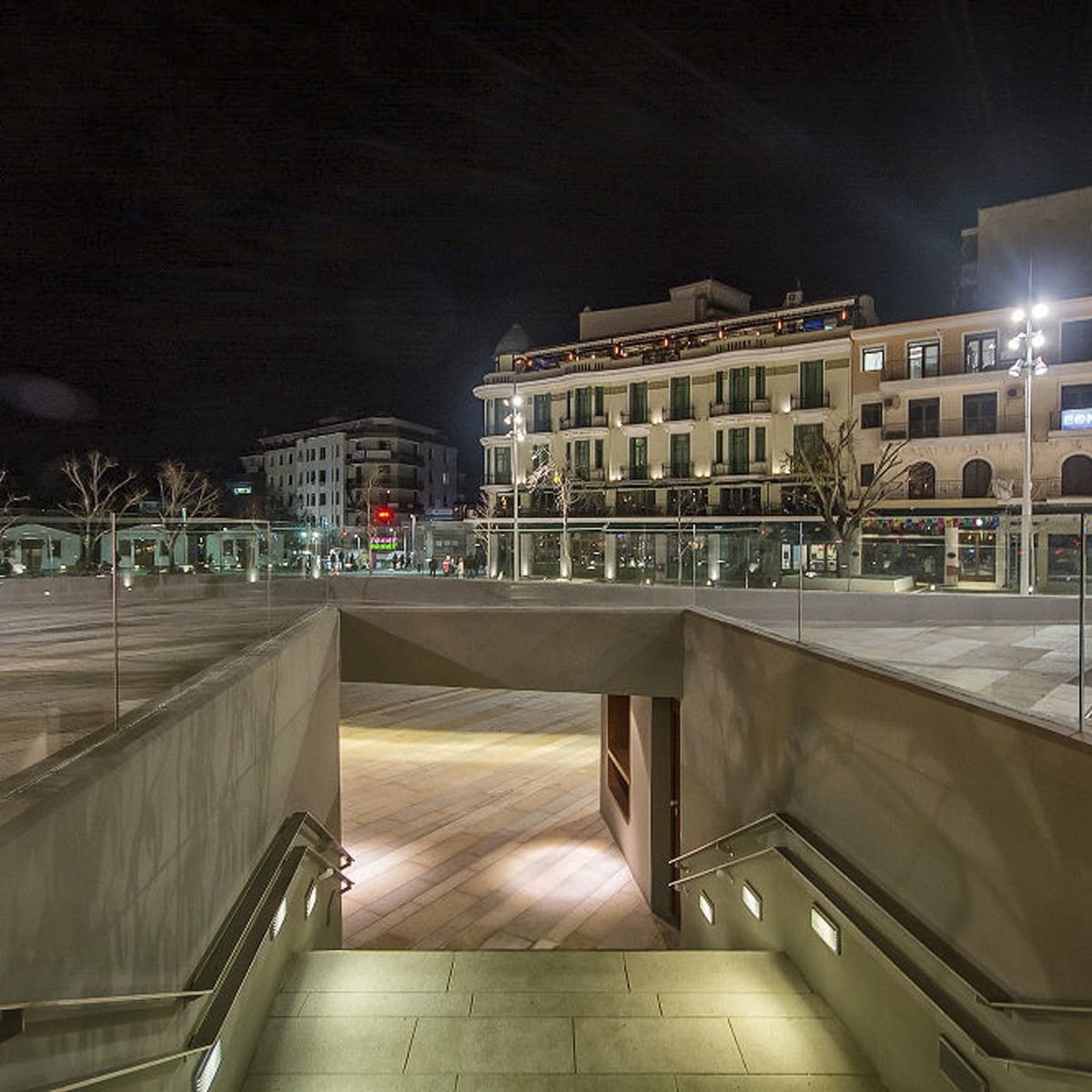 Stone stairwell and night lighting in a public square